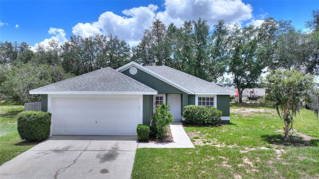 Photo of 128 Burgoyne Loop, Davenport, FL 33897 (MLS # O6414549)