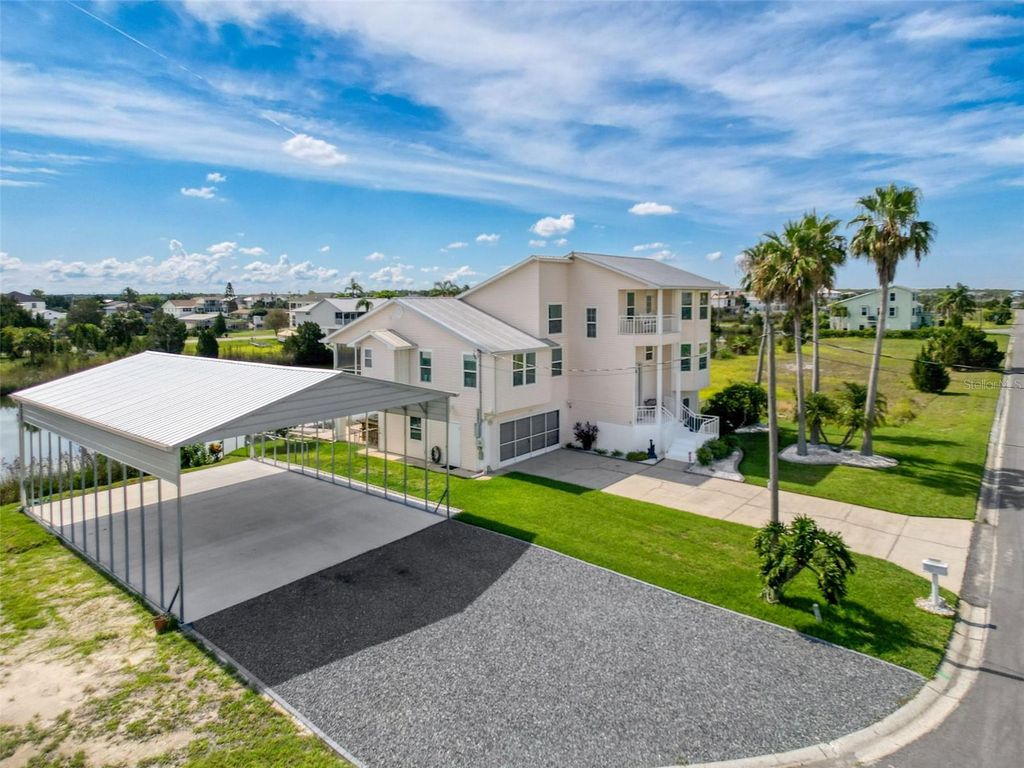 Photo of 3342 Turks Cap Drive, Hernando Beach, FL 34607 (MLS # W7876906)