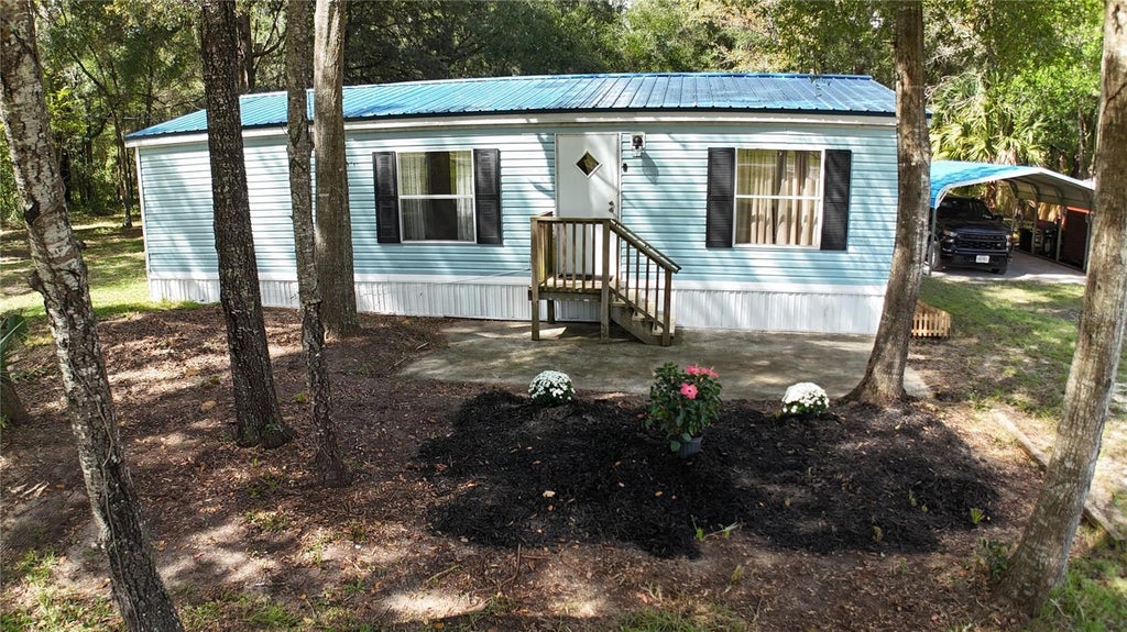 Photo of 10851 NE 110th Lane, Archer, FL 32618 (MLS # GC544219)