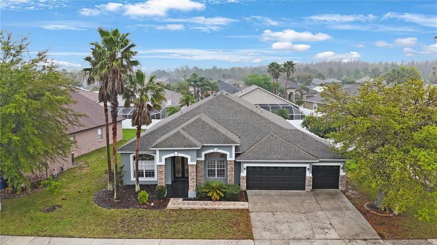 Discover this magnificent single family residence with five spacious bedrooms, three bathrooms, luxury swimming pool with spa home situated on a huge private 9840 sqft lot in gated Covington Estates. This beautiful maintained home features open floor concept, as you walk in the front door, you will be greeted by the formal dining room and office space. Step into the spacious modern kitchen with brand new granite counter top and brand new light fixture with all stainless steel appliance, the light filled living room designed for both relaxation and family gatherings, whether you envision cozy movie night, elegant entertainment or a comfortable retreat, this living room offers endless possibilities for endless family time. Step from the comfort of your spacious living room directly into the private backyard oasis where a sparkling swimming pool awaits whether to entertain guest or to rewind for the day. Escape to your private master suite, the en-suite bathroom boasts a spa like garden bath, with separate his and hers dual vanity, walk-in shower, walk-in closet and enclosed toilet room. Luxury vinyl flooring throughout the entire home with tile in wet area, no carpet for easy cleaning and maintenance. Enjoy hosting family and friends with the built-in outdoor grill and BBQ station, conveniently located near the pool for seamless entertaining. Weather you are grilling up a feast, lounging by the water, or simply enjoying outdoor dining under the open sky, this space is designed for year-round enjoyment. AC installed 2018, roof installed 2017, new water heater installed 2025. All of this in the exclusive community of Covington Estates at Cross Creek, conveniently near Cross Creek Park and with expedient access to I-75, I-275 and I-4. Plenty of shopping, dining and entertainment attractions in the neighborhood, golf courses and country clubs, The Shops at Wiregrass, Tampa premium outlet, USF, hospitals, Moffit center, MOSI, Busch Garden, Adventure Island, Tampa Zoo, Tampa Aquarium, Channel side, Tampa Downtown, Riverwalk, Armature Works, Tampa International Airport all can be reach in about 30 min drive. The sun shine state famous beach such as Clear water beach and St. Petersburg Beach can be reach in about 1 hour drive. Don't wait and schedule a showing today!