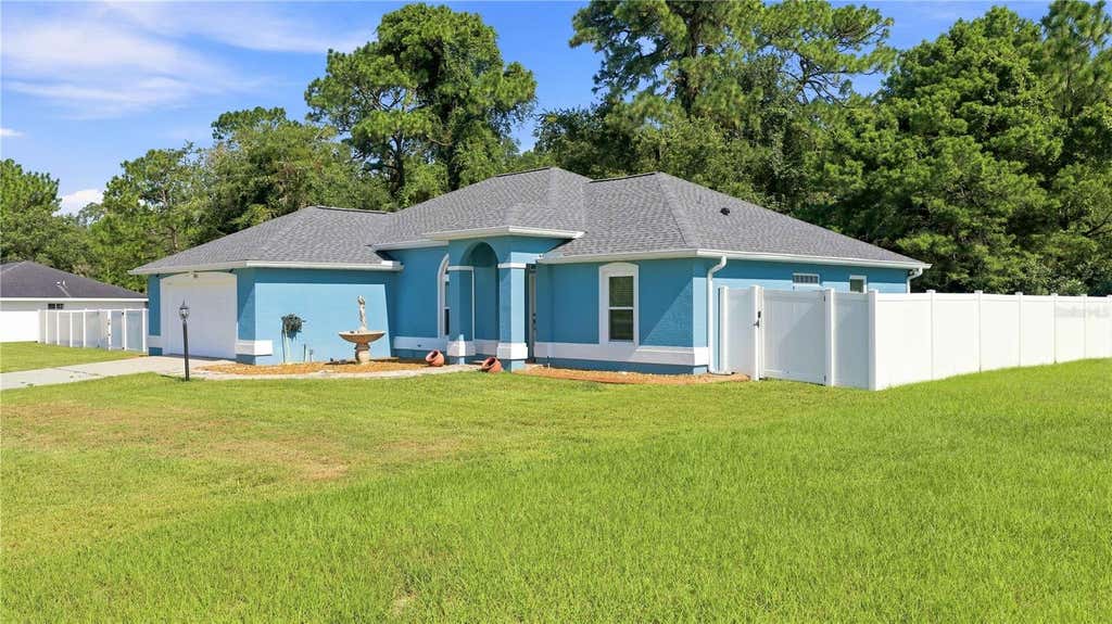 Photo of 7411 SW 128th Street, Ocala, FL 34473 (MLS # OM729907)