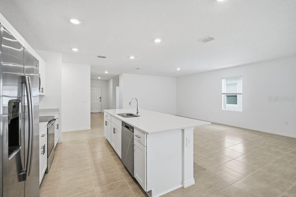 Photo of 13520 Tropical Breeze Way, Hudson, FL 34669 (MLS # TB8444588)