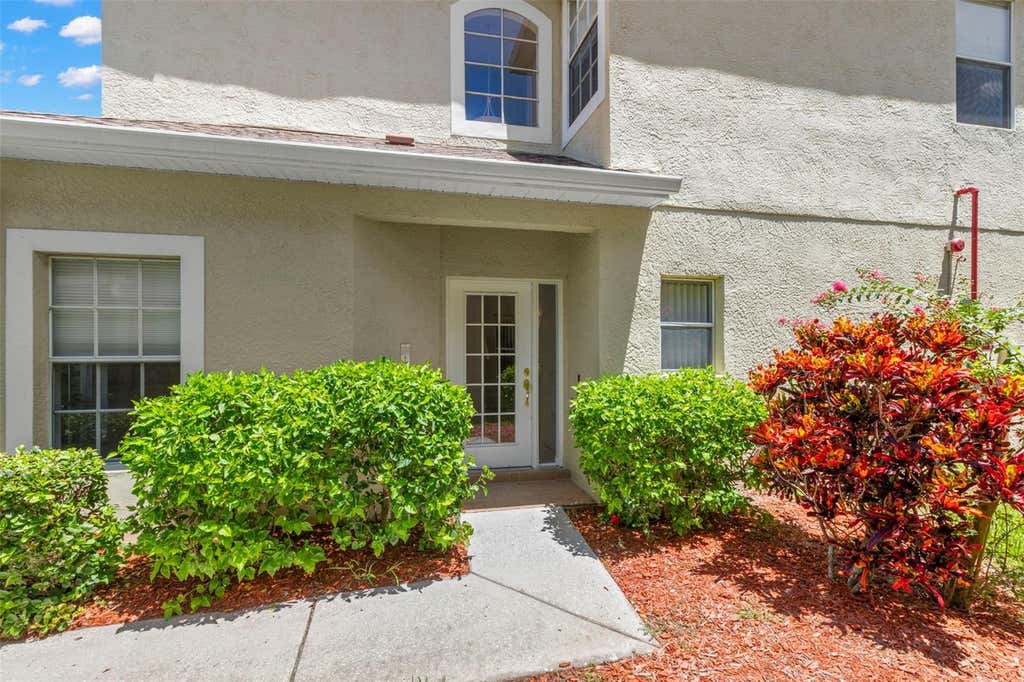 Photo of 11117 Kapok Grand Circle, Madeira Beach, FL 33708 (MLS # TB8538542)