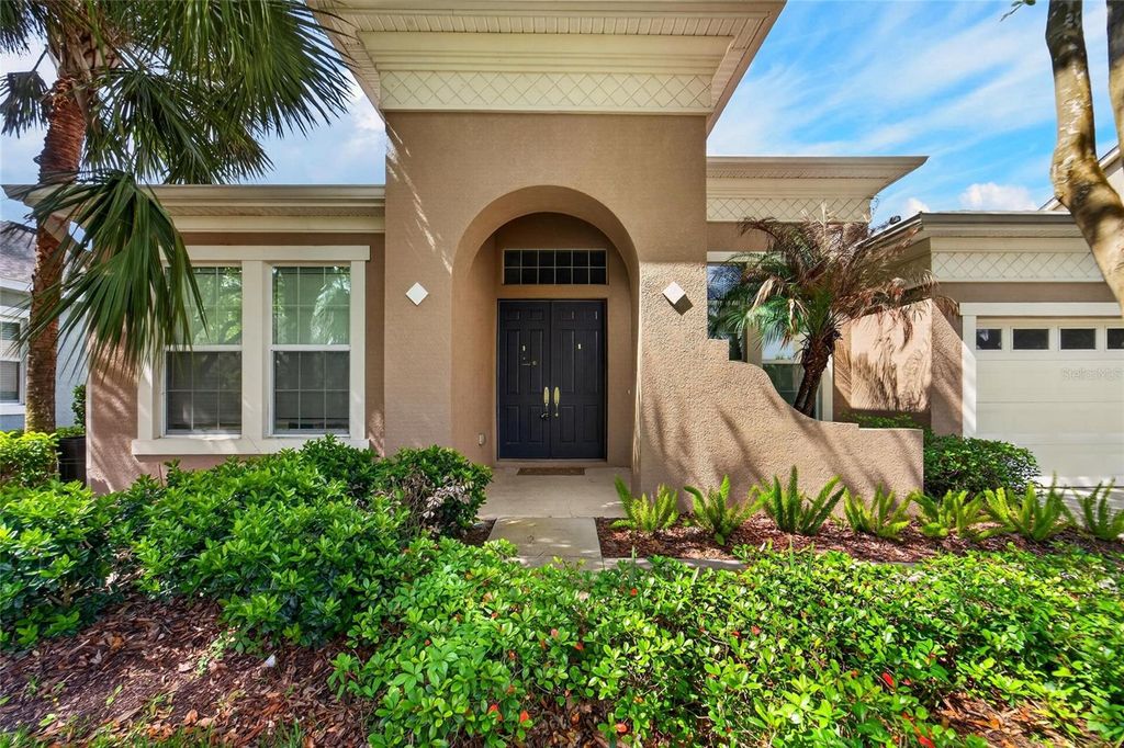 Photo of 15921 Persimmon Grove Drive, Lithia, FL 33547 (MLS # TB8490557)