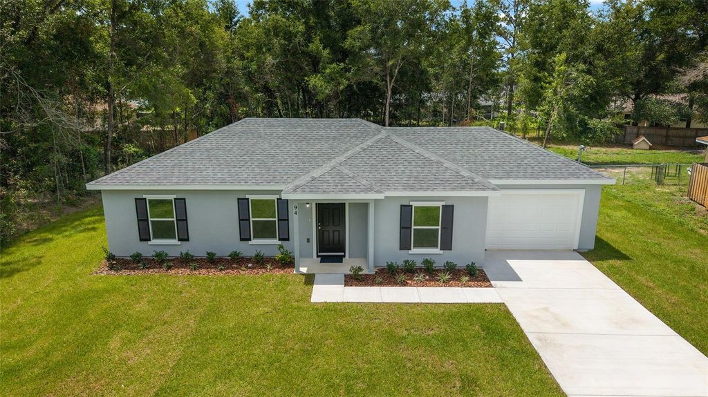 Photo of 94 Dogwood Drive Loop, Ocala, FL 34472 (MLS # OM725844)