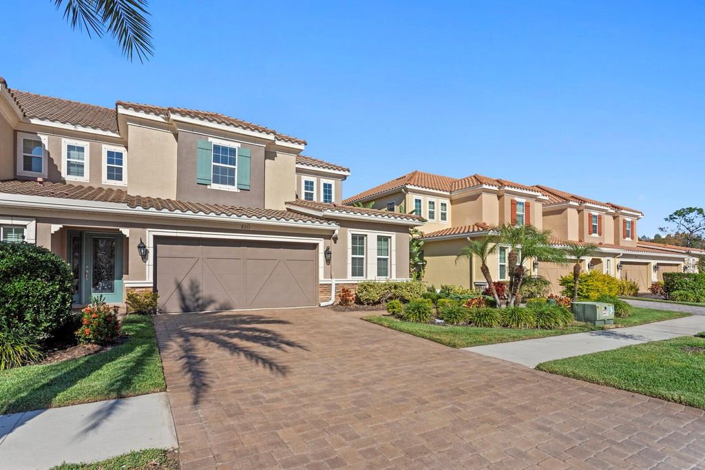 Photo of 8711 Terracina Lake Drive, Tampa, FL 33625 (MLS # TB8456281)