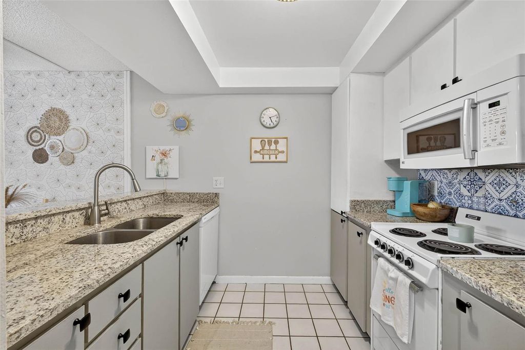 Photo of 2614 Cove Cay Drive #405, Clearwater, FL 33760 (MLS # TB8494589)