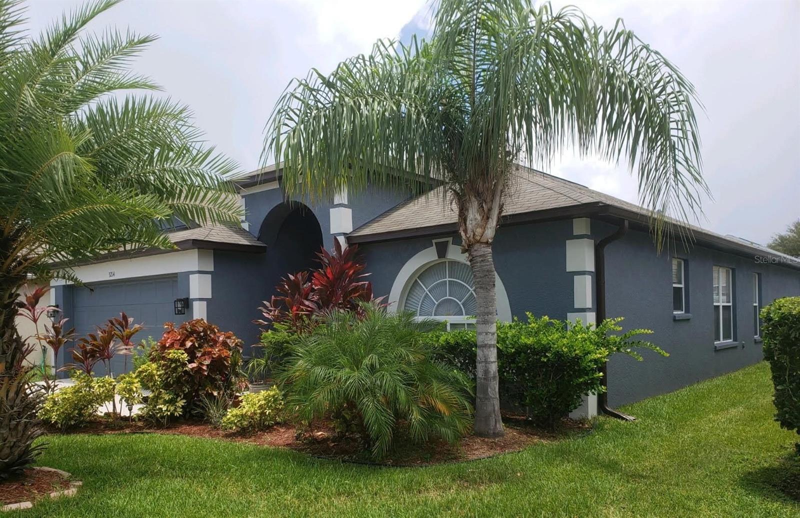 Welcome to your future home in Suncoast Meadows, Land O' Lakes, FL! This charming property offers a prime location with easy access to highways, restaurants, shopping, schools, and hospitals. You'll appreciate the Open floor plan, NO CARPET throughout, 3 bedrooms, 2 full bathrooms, eat-in kitchen, dining, and a laundry room with washer and dryer included. The Primary Bedroom offers a large walk-n closet, and en suite bath that has been updated with quartz counters, double sinks, shower and soaking tub. The Split plan provides privacy with the secondary beds/bath. Entertain or enjoy the serenity of the large covered, screened patio and nice size, fenced back yard with Lawn Service included. Access to the Community Pool, and Playground are only a block away! Don't miss the chance to make this property your new home. Contact us today for more information and to schedule a viewing!