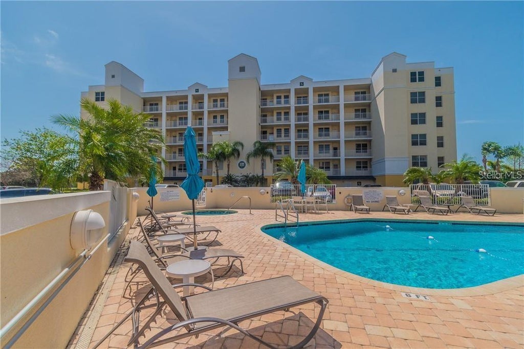 Photo of 1200 Country Club Drive #2106, Largo, FL 33771 (MLS # TB8539811)