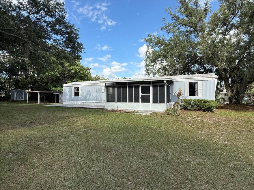 Come enjoy a piece of quietness in your own slice of heaven. This 1993 single wide mobile home offers 2 bedrooms and 2 full baths. Home is move in ready. Has plenty of space outside for your toys. Concrete slab for grilling or social gatherings, screened room, covered carport and shed for storage. Come check out this home before its gone.