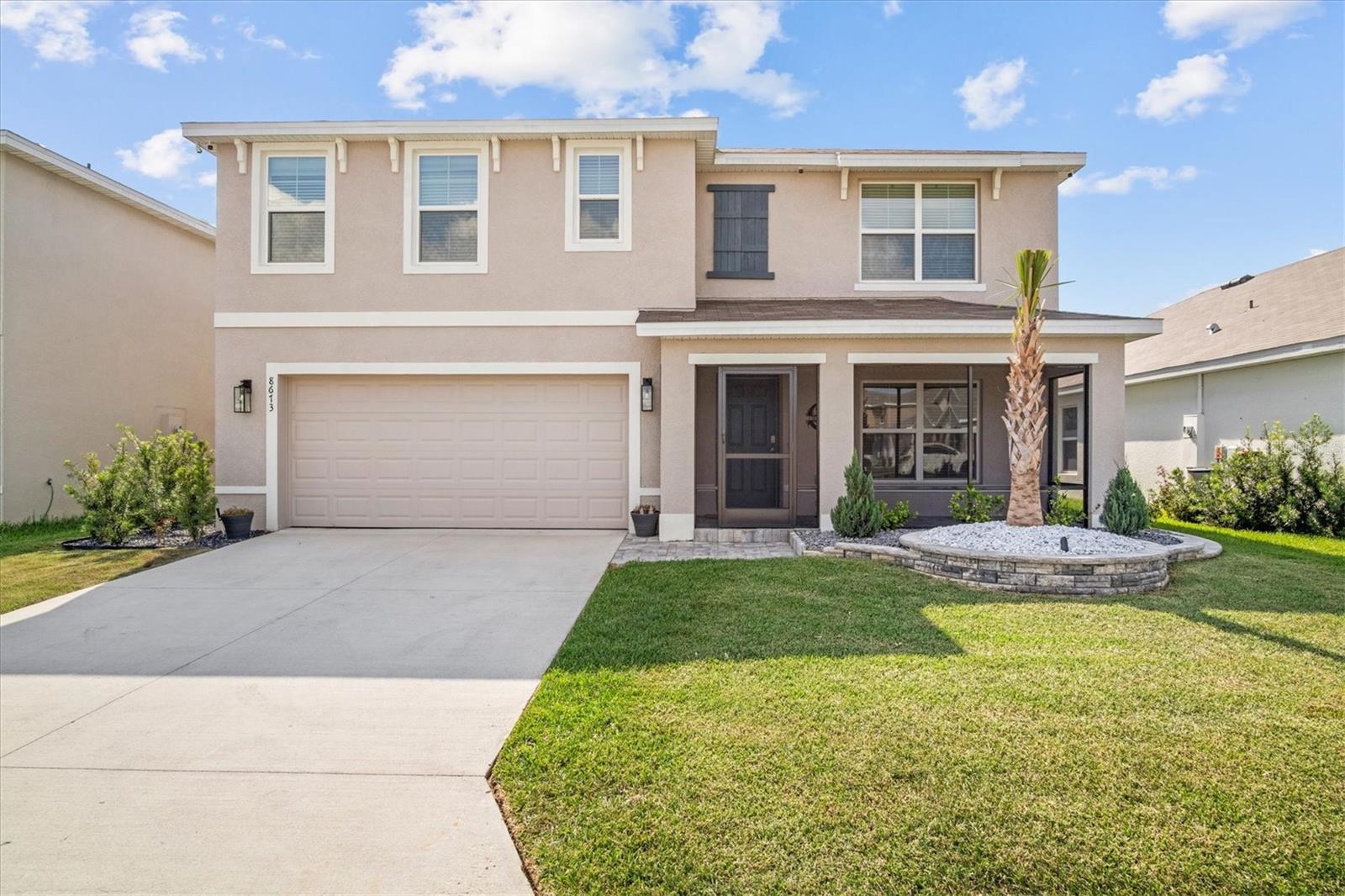 Welcome Home! Situated in the secluded neighborhood of Triumph this 5BR/3BA home is perfectly located within minutes from The Villages, Brownwood, Trailwinds Plaza, Lake Miona, Schools and so much more with a ton of ongoing projects like a brand new Target just minutes away. This spacious 5BR/3BA home is comprised of 2,605+/- SQFT under air with a den/office, a two-car garage, an inside utility room, and a playroom. The kitchen features shaker cabinetry with updated fixtures, stainless steel appliances, a massive island, and added lighting. Overlooked by the kitchen the living room and dining offer an open floor plan with an abundance of space for family time and easy access to the fenced-in backyard. The master suite features his/her closets, a private lavatory, a walk-in shower, and his/her sinks with quartz countertops. Upstairs you are welcomed with a lounge/ play area perfect for entertaining or a playroom. The spare bedrooms are spacious with shared hall/bedroom bathrooms. As if the inside wasn't good enough you'll fall in love with the backyard featuring a patio pad and NO REAR neighbors. With tons of upgrades and the size of this home, you'll love everything from the curb to the backyard with convenience to everything. So don't hesitate and call today before it's gone!
