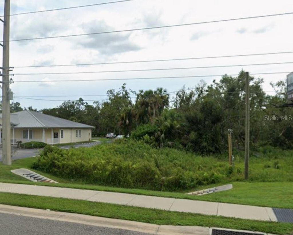 Photo of 897 Tamiami Trail, Port Charlotte, FL 33953 (MLS # C7498466)