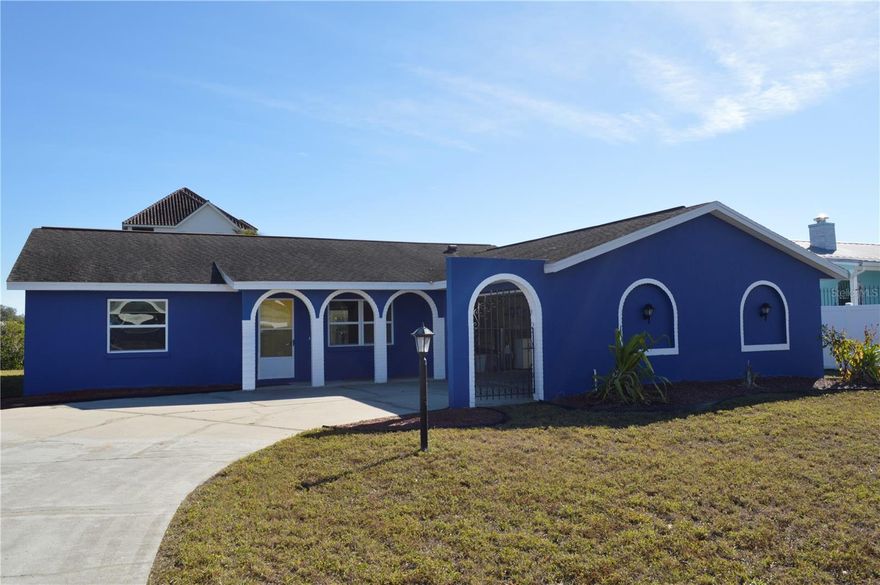 One or more photo(s) has been virtually staged. APOLLO BEACH WATERFRONT. Vacation all year long in this beautiful canal-front home on the Manila Palm Canal, located in the highly desirable Sabal Key community. Enjoy the serenity of waterfront living with a deep-water canal offering direct access to Tampa Bay, the Gulf of Mexico, and beyond. (Boat dock present; landlord to establish terms of use.) This move-in-ready residence offers an exceptional floor plan with effortless flow, ideal for both everyday living and entertaining. Bright and spacious, the 3-bedroom, 2-bath home features 1,551 sq. ft. of living space, a 2-car garage, and fresh interior and exterior paint. Upon entry, the foyer welcomes you into an open-concept layout filled with natural light, seamlessly connecting the living room, dining area, great room, and kitchen. The kitchen serves as the heart of the home, featuring stainless steel appliances, solid wood cabinetry, and adjacent dining and dinette spaces designed for gathering and connection. The primary suite is generously sized, comfortably accommodating a king-size bedroom set, and includes a large walk-in closet and a private en-suite bath. The secondary bedrooms are bright, spacious, and well-appointed. Step outside to the expansive covered lanai, the perfect setting for relaxing, entertaining, or enjoying tranquil water views year-round. The spacious backyard offers mature trees and lush landscaping, creating a private outdoor retreat. The garage is enhanced with extensive built-in cabinetry, providing excellent storage and workspace. A washer and dryer are included, and the home is equipped with a new A/C unit, offering added comfort and peace of mind. Situated on a quiet cul-de-sac on a generous 79 x 138 lot, this canal-front home is centrally located with convenient access to US-41, I-75, I-275, and US-301, as well as Tampa, Brandon, Bradenton, St. Petersburg, USF, MacDill AFB, Port Tampa Bay, SeaPort Manatee, major airports, shopping, dining, and entertainment.