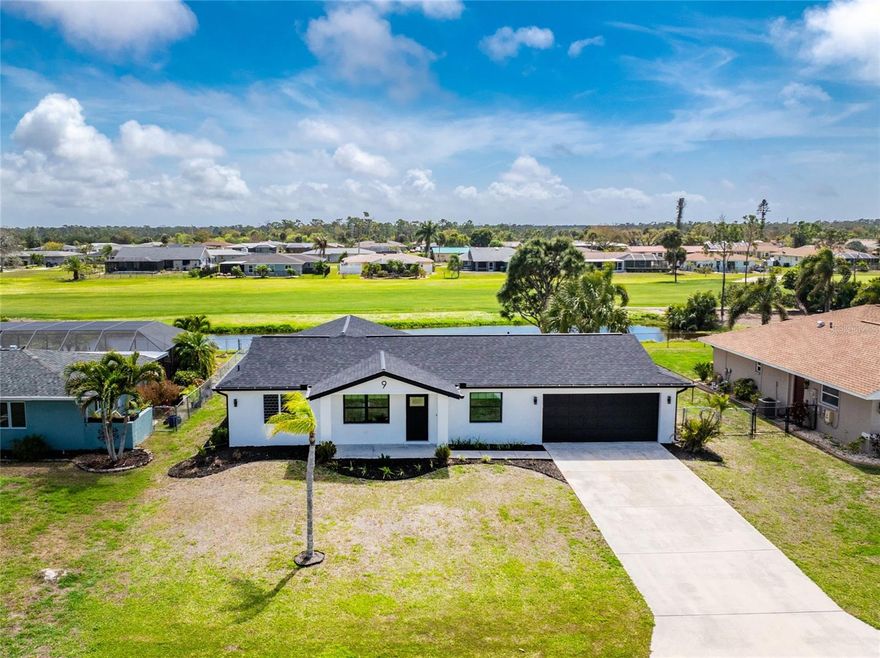 Modern Luxury Meets Beautiful Pond and Golf Course Views in This Fully Remodeled Oakland Hills Home! Enjoy peace of mind with impact windows and an impact garage door, an X flood zone classification for the home structure, a 2024 roof, and a complete interior renovation. The charming exterior, highlighted by a long driveway, refreshed landscaping, and inviting curb appeal, sets the stage for the stylish updates found inside. Luxury vinyl plank flooring flows seamlessly throughout this two bedroom, two bathroom home, creating a cohesive and easy to maintain living space. Neutral paint tones and an open great room floor plan fill the home with natural light and create a bright, welcoming atmosphere. The beautifully updated kitchen features white shaker style cabinetry with soft close hinges, quartz countertops, custom hardware, a farmhouse sink, stainless steel appliances, and a large center island with pendant lighting for easy everyday living. The formal dining area offers flexibility with sliding glass doors that open to the screened patio, making it perfect as a dining room or additional family room space with easy access to outdoor living. The primary bedroom suite features sliding glass doors to the lanai, a spacious walk-in closet with a custom organizer system, and a barn style door leading to the private bathroom. Here you will find a dual sink vanity with quartz countertops and a large fully tiled walk-in shower with niche detail and a rain style shower head. The guest bedroom includes two reach-in closets and also functions as an ensuite with a beautifully updated bathroom featuring a quartz topped vanity and fully tiled walk-in shower. A convenient second door allows this bathroom to be accessed from the kitchen area as well. Step outside to the covered and screened patio with tile flooring that overlooks the backyard and the scenic pond and golf course beyond. The spacious yard offers room to add your own pool, expand the patio, or create a garden or outdoor entertaining area while enjoying peaceful water and golf course views as your backdrop for relaxing evenings under the stars. Located within the Oakland Hills section of Rotonda West, this deed restricted community offers an active Florida lifestyle with golf, tennis, pickleball, hiking trails, community events, and excellent fishing opportunities nearby. The home is also less than ten miles from Englewood Beach where residents can enjoy sunny days on the sand, waterfront dining, local restaurants and tiki bars, or beautiful Gulf Coast sunsets with live entertainment. From morning coffee overlooking the water and golf course to evenings enjoying the peaceful outdoor setting, this beautifully renovated home is ready to be enjoyed at 9 Oakland Hills Court.
