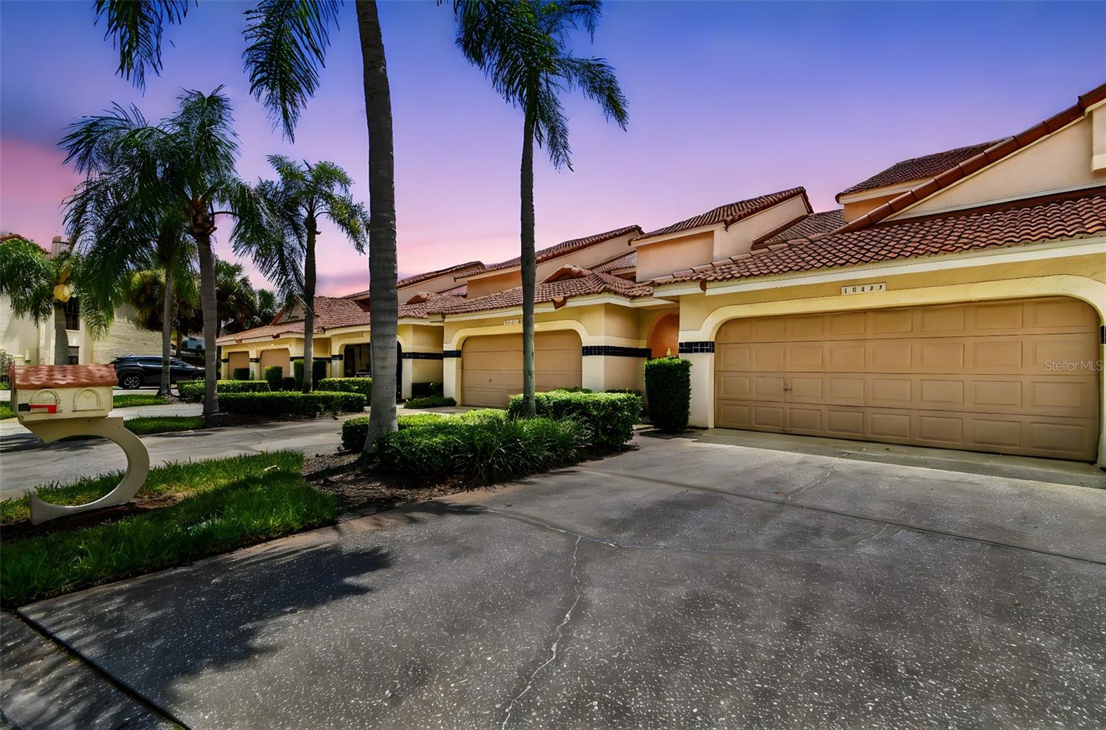 Welcome to 10444 Saint Tropez Place, an elegantly updated 3-bedroom, 2.5-bath townhome in the desirable enclave community of San Marino Bay. Offering nearly 1,800 square feet of light-filled living space, this home blends comfort, style, and a true Florida waterfront setting. Step inside to soaring ceilings, multiple skylights, and a spacious open floor plan that’s both inviting and functional. Laminate flooring flows throughout the main living areas, while a double-sided stone fireplace adds warmth and architectural charm. The gourmet kitchen features stainless steel appliances, quartz countertops, and designer cabinetry—perfect for everyday living and entertaining. Upstairs, the primary suite boasts dual closets and a fully renovated en-suite bath, while the additional bedrooms and bonus loft space provide flexibility for a home office or guest area. All bathrooms have been thoughtfully updated with modern finishes. Step outside to your private screened lanai and Hardie board deck, where travertine marble tile adds a luxurious touch to the outdoor space. Overlooking a tranquil saltwater canal, it's the perfect setting for morning coffee or peaceful sunset views. The home also includes a spacious two-car garage with extra storage. Community amenities include a pickleball court available for daily use, as well as boat slips available upon request in both San Marino and neighboring Port Colony—offering added lifestyle appeal for boating and water-lovers alike. Ideally located just minutes from Downtown Tampa, Tampa International Airport, Westshore and International Plaza, and a short drive to the Gulf Coast’s world-class beaches, this home offers the perfect mix of serenity and convenience.