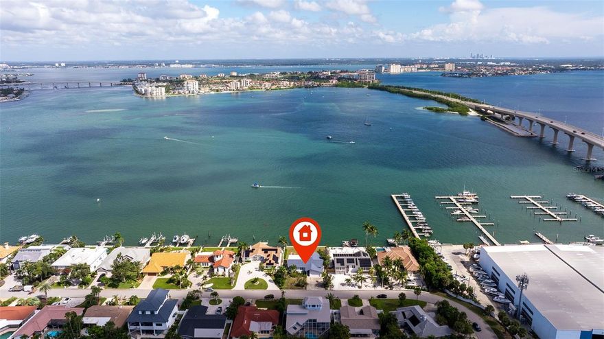 In the exclusive enclave of Tierra Verde, where the Gulf of Mexico meets Tampa Bay, lies and extraordinary opportunity to create your architectural masterpiece.  This prime waterfront parcel offers 85 feet of direct water frontage along the main channel, with sweeping views towards Isla del Sol and the iconic Don CeSar - that has defined Gulf Coast elegance since 1928. On a protected stretch of Tierra Verde's waterfront, 85 feet of deep water frontage awaits transformation.  This 0.29-acre parcel - one of the last remaining opportunities along the main channel - offers the rarest of luxuries: a blank canvas where architecture and environment can converge without compromise. This buildable waterfront property presents a rare occasion to design and construct an estate in one of Florida's most sought-after coastal communities.  The generous dimensions accommodate sophisticated architectural vision, while the sailboat-depth waters invite the yachting lifestyle that defines waterfront luxury.  Tierra Verde occupies a privileged position at the mouth of Tampa Bay, offering immediate access to the Gulf while mainintaining protected waters.  Fort De Soto Park - consistently ranked among America's finest beaches - lies moments away, providing 1.136 acres of pristine Florida coastline.  The property balances seclusion with convenience: downtown St Petersburg's cultural renaissance is a short drive north, while Tampa International Airport serves destinations worldwide.  The parcel's residential zoning accommodates a custom estate worthy of this prestigious address.  Deep water access enables the construction of a private dock for vessels of significant size, while the northern exposure captures the interplay of light across the water throughout the day.  FORT DE SOTO PARK: Minutes from the property, this five-island park consistently ranks among America's finest beaches.  Beyond pristine sand and Gulf waters, the park offers kayak trails, historic fortifications, and nature observation that appeals to thos who value environment as much as amenities.  BOATING & FISHING: Tierra Verde provides the rare combination of protected bay waters and Gulf access.  The main channel - directly fronting this property - connect to Tampa Bay's extensive cruising grounds: Egmont Key, the Sunshine Skyway, St Petersburg's waterfront district, and open Gulf waters beyond. BEACHES: Beyond Fort De Soto, Pass-A-Grille Beach and St Pete Beach extend northward, offering additional Gulf access and the kind of sunset views that have define Florida's west coast for generations.  ST PETERSBURG: Just a short drive from the restaurants, murals, world-class museums, the Mahaffey Theater and all that the downtown St Peterburg offers. TAMPA INTERNATIONAL and ST PETE/CLEARWATER AIRPORTS: This property provides easy access to both of these airports which can be easily accessed via I-275. 155 1st Street West, where architectural vision meets irreplacable waterfront