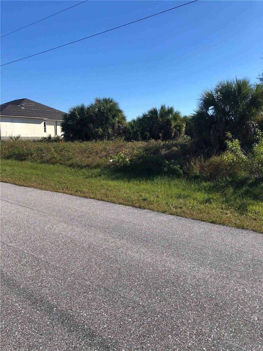 Photo of 13257 Longville Avenue, Port Charlotte, FL 33981 (MLS # D6133610)