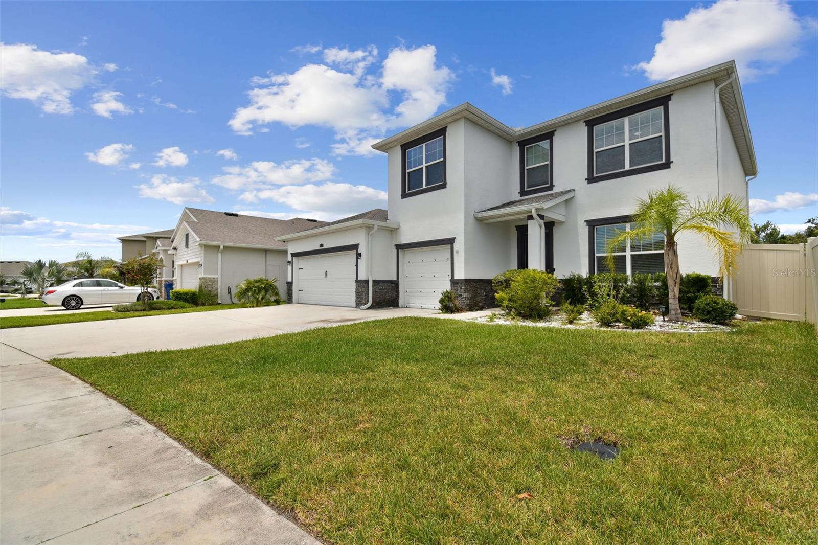 Spacious 5-Bedroom Home with 3-Car Garage in Union Park!
Welcome to this beautifully maintained 5-bedroom, 3-bathroom two-story home located in the highly desirable Union Park community. Built in 2021 and offering 3,113 heated square feet, this home combines modern design with functional living. As you enter, you're welcomed by a flexible office space with glass doors, currently used as a sixth bedroom. The entry hallway features both a coat closet and a separate storage closet. Continue into the expansive open-concept kitchen and living area, perfect for entertaining. The kitchen boasts granite countertops, stainless steel appliances, abundant cabinetry, and a spacious walk-in pantry—ideal for any home chef. Downstairs also includes a guest bedroom and full bathroom, perfect for visitors or multi-generational living. Upstairs, you'll find four additional bedrooms, all with walk-in closets, and a large loft/game room that’s perfect for a home office, media center, or play area. The primary suite offers a serene retreat with dual walk-in closets, a soaking tub, and a separate glass-enclosed shower. Conveniently, the laundry room is also located on the second floor, along with extra storage throughout the home and in the spacious 3-car garage. Situated in the sought-after Union Park community, you'll enjoy resort-style amenities including a pool, splash pad, playgrounds, trails, and more—all surrounded by natural beauty. Don’t miss your opportunity to own this stunning home in one of Wesley Chapel’s most desirable neighborhoods!