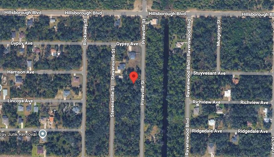 A fantastic opportunity to build and begin a new chapter. Lot located in Port Charlotte, offers the perfect balance of tranquility, convenience, and growth potential.

Surrounded by established homes and with easy access to shopping, schools, and major roads, this lot is ideal for developing your dream home or making a sound investment in a high-demand area. Here, you're not just buying a lot; you're investing in your future, stability, and quality of life.