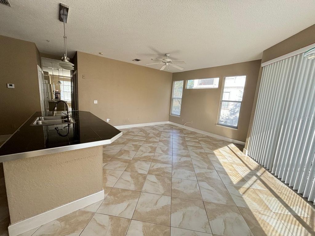 Photo of 2513 Maitland Crossing Way #202, Orlando, FL 32810 (MLS # O6362099)