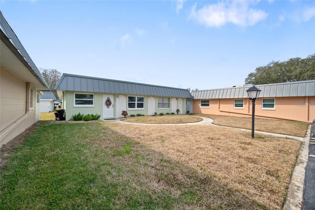 Photo of 11837 Boynton Lane #11837, New Port Richey, FL 34654 (MLS # W7890280)