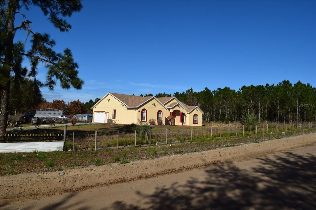 Photo of 7901 N Cherry Lake Groves Road, Groveland, FL 34736 (MLS # S5144382)