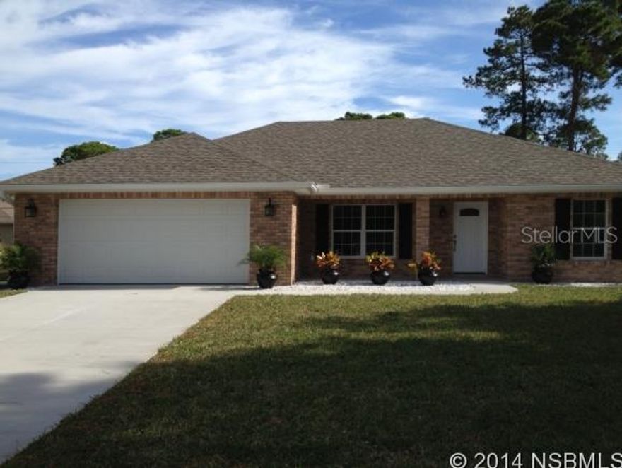 Seller says SALE!! NEWEST HOUSE in FLORIDA SHORES!This is not a fixer upper, its done- this house is move in ready.This 2013 Charmer includes a Gourmet Kitchen- All Stainless Steel full appliance package including 26 cu.ft. refrigerator. Split plan, with over-sized garage. ;Water: City