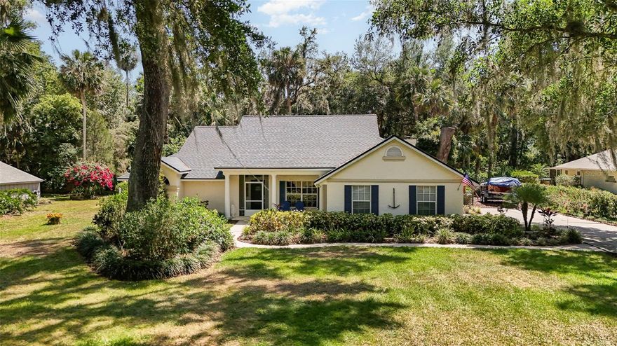 This beautiful 3-bedroom 2-bath home is situated on over a half acre of land in the highly desirable Lake Beauclaire Community. Located on a tree-covered cul-de-sac, the home is set back from the road with an oversized driveway accessing the side entry garage with plenty of room for your RV or boat. The split 3-bedroom floor plan with cathedral ceilings and crown molding enhancements is anchored by a large kitchen, a formal dining room, and a family room with a wood-burning fireplace, all of which provide views and access to the screened pool and spa and outdoors. The backyard privacy is enhanced by the lush tropical foliage and canopy of trees shading the walkways and sitting area, a great place to enjoy your own tropical paradise. The community boat ramp is just around the corner, with access to the "Harris Chain of Lakes" from Lake Beauclaire, where you can enjoy a day on the water.  
Recent updates adding to your peace of mind, including HVAC 2022, septic and drainfield 2023, roof shingles 2013, water heater 2017, dishwasher and stove 2022. 
Call Today to schedule your showing and see what it would be like to live the "Florida Lifestyle".