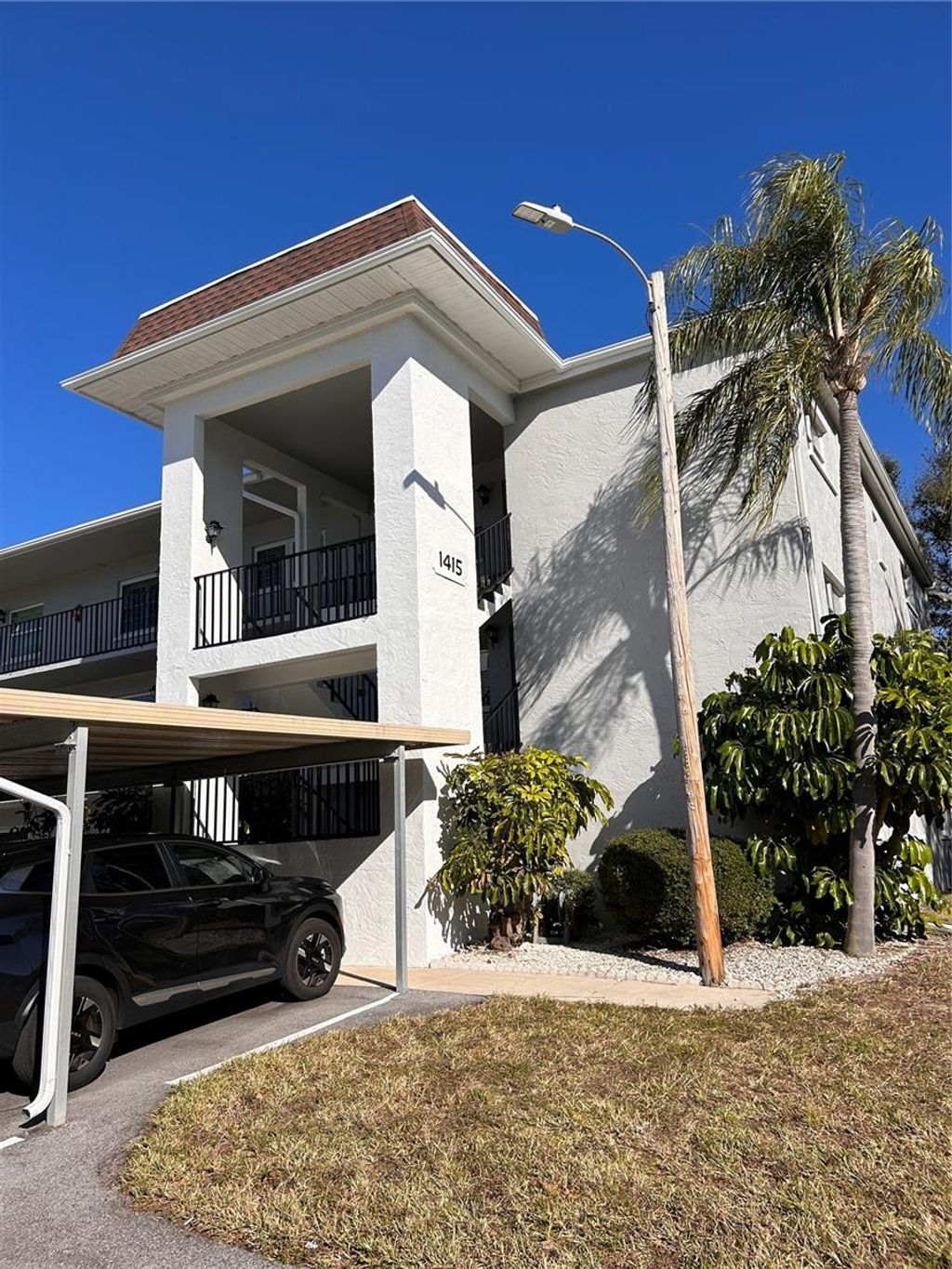 Photo of 1415 Doolittle Lane #307, Dunedin, FL 34698 (MLS # TB8472572)