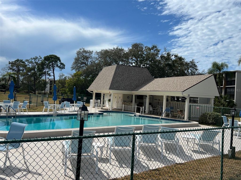 Photo of 1415 Doolittle Lane #307, Dunedin, FL 34698 (MLS # TB8472572)