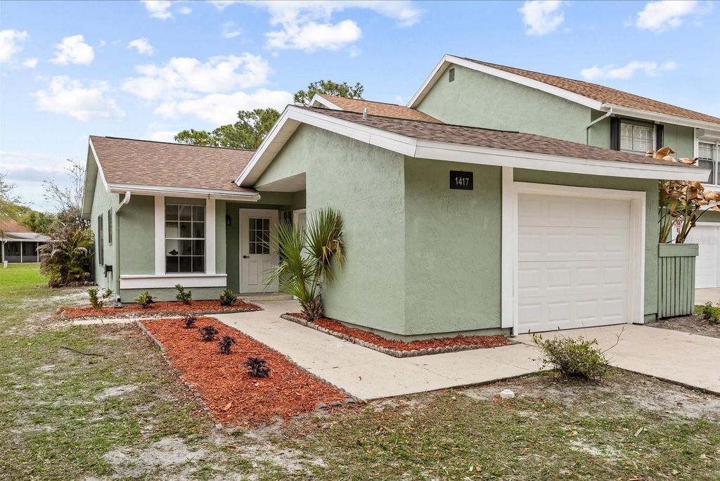 Photo of 1417 SE Rivergreen Circle, Port Saint Lucie, FL 34952 (MLS # O6392366)
