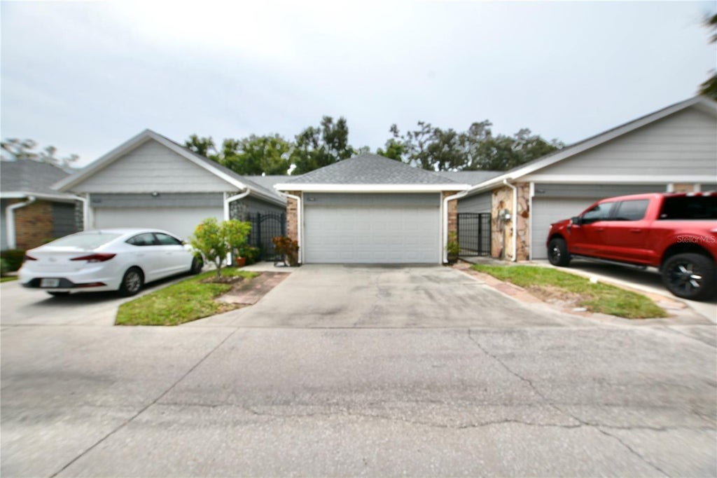 Photo of 1762 Castle Rock Road, Tampa, FL 33612 (MLS # TB8552597)
