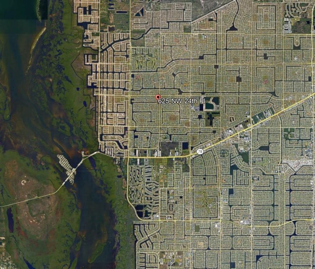 Photo of 625 NW 24th Place, Cape Coral, FL 33993 (MLS # TB8439070)