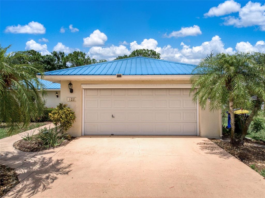 Photo of 127 Blue Moon Avenue, Lake Placid, FL 33852 (MLS # P4935336)