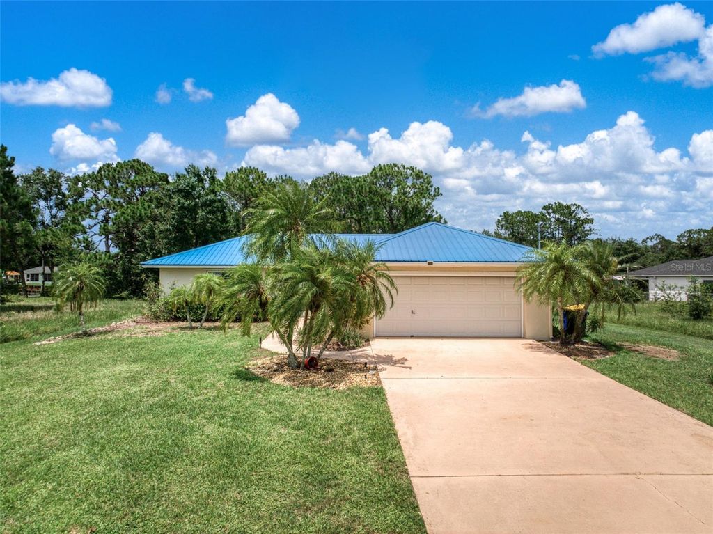 Photo of 127 Blue Moon Avenue, Lake Placid, FL 33852 (MLS # P4935336)