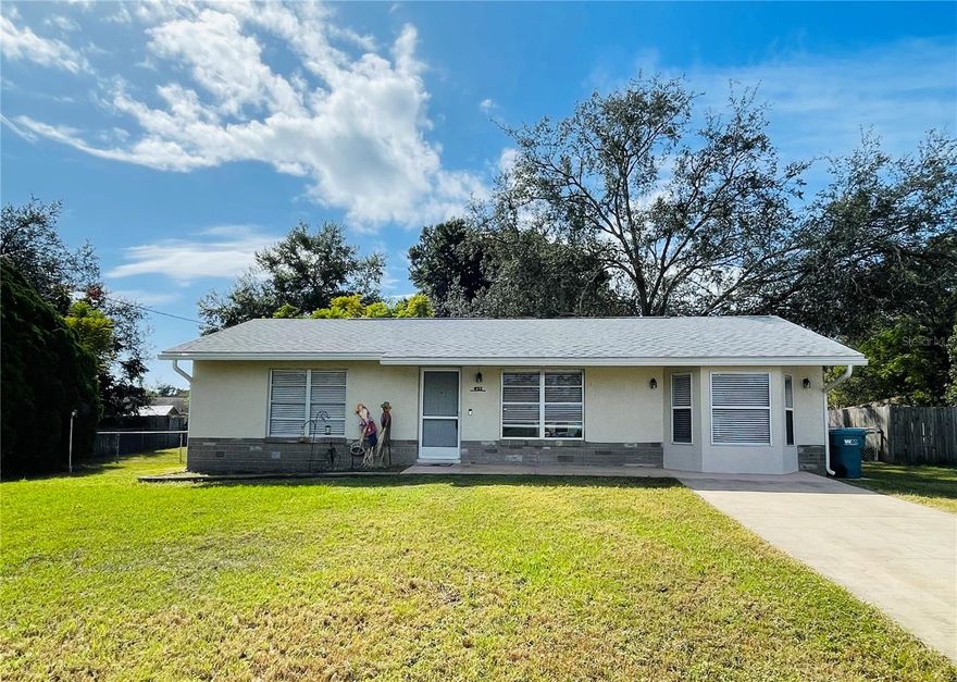 Cute as a button starter home!  3/1 concrete block home with generous size kitchen and breakfast nook, appliances and pantry. NEWER stove. The garage has been converted to spacious master bedroom with bay window. Step behind the sliding barn door and there is small closet area, in addition to the laundry area (NEWER washer & dryer). On the other side are the (2) bedrooms and full bath. A really nice feature about this house is that it has LOTS of closets. Screened in back porch with tile floors overlooks the fenced in back yard with small shed for your lawn equipment. Open patio. The front screen door allows you to enjoy the nice cool brisk days. Located on a paved street in quiet neighborhood. Newer roof.