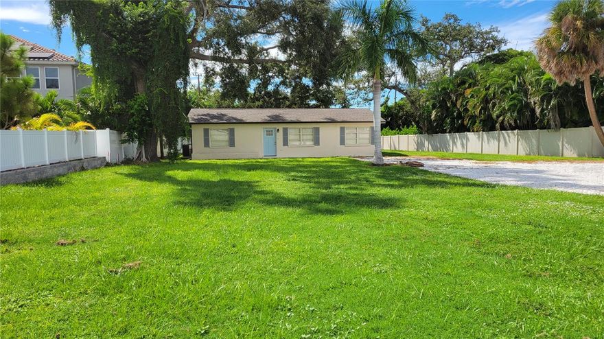 Seasonal/ short term rental  Beautifully remodeled private and tranquil home on large fenced lot in Sarasota very close to the north end of Siesta Key. This home is flooded with natural sunlight from abundant windows through this open floor plan. The kitchen is spacious with solid wooden cabinetry topped with slab granite counters with breakfast bar, custom tile backsplash and stainless steel appliances. The dining table seats eight people easily with additional seating for 4 at the counter. The furniture is stylish, modern, sleek and comfortable. This property is pet friendly (no aggressive breed allowed). If you want a wonderful base camp for your next vacation, this is it. You will find yourself close to Siesta Key beach, the #1 rated beach in the country. This home is also convenient to shopping, casual and fine dining, downtown Sarasota, museums, the theater and opera. CALL now for your turn in the Florida sunshine!