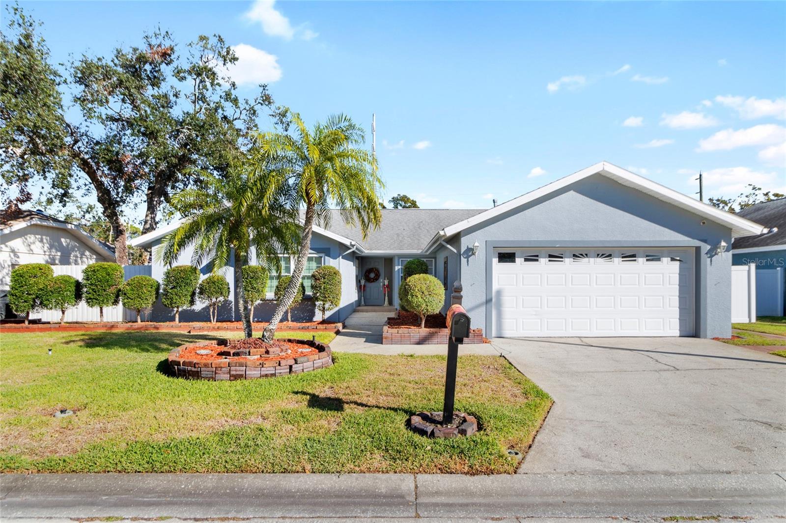 Welcome to your next chapter in sunny St. Pete! This 3-bedroom, 2-bathroom home is tucked inside the private enclave of Glen Lake Estates — a community where pride of ownership shines and neighbors quickly become friends. The home features a bright, open-concept layout with new luxury vinyl flooring throughout. The kitchen offers a gas range, granite countertops, stainless steel appliances, soft-close cabinetry, and under-cabinet lighting. Both bathrooms were fully renovated in 2024, and recent upgrades include a 2021 HVAC system, hurricane-rated garage door, fresh interior and exterior paint with a transferable warranty, and a fully fenced backyard. For peace of mind, the property has never flooded and comes with a transferable flood insurance policy at $1,630/year. Glen Lake Estates is one of North St. Pete’s best-kept secrets — peaceful and private, yet minutes from I-275, Gandy Boulevard’s shopping and dining, St. Pete–Clearwater Airport, and vibrant Downtown St. Petersburg.