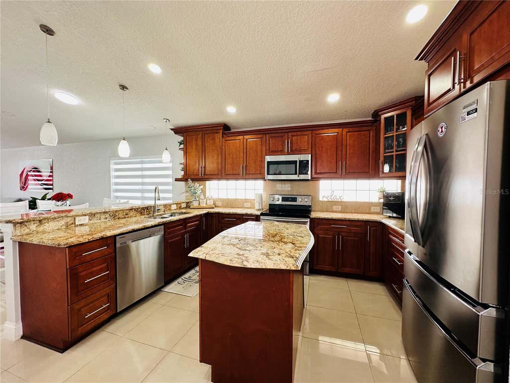 Photo of 8885 Palisades Beach Avenue, Orlando, FL 32829 (MLS # S5155030)