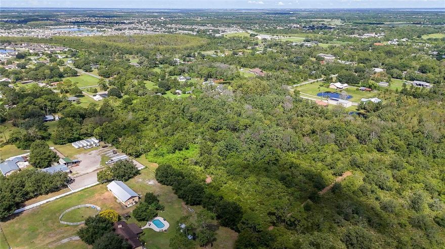 Discover the perfect opportunity to own a serene piece of land in the well-established community within Edsel Avenue & Oakwood Drive in the picturesque town of St. Cloud, Florida. Situated within the Agricultural Development and Conservation (OAC) district, this property is designed to preserve agricultural and rural land uses while allowing for residential development. This unique zoning not only ensures the land's natural beauty and agricultural potential are maintained, but it also offers the perfect setting to embrace a rural lifestyle. Property Features:  Size: just under 5 Acres -/+ - Zoning: Agricultural Development and Conservation (OAC) District - Location: Conveniently located in St. Cloud, providing easy access to local amenities, schools, and recreational activities. - Terrain: Flat, lush, land, ideal for both agriculture and residential development. Ideal for those who long for Old Florida, " A Land Remembered," and Animal Lovers: This property is an excellent choice for those who dream of having a little ranch. With ample space for livestock, gardens, or equestrian activities, you can create the homestead you’ve always wanted. Imagine playing freely, raising animals, and enjoying the outdoors right in your backyard. The AC zoning allows for limited residential development, making it possible to build your dream home while preserving the charm and tranquility of rural living -- Potential Uses can be: - Agricultural pursuits (farming, ranching) - Equestrian facilities - Gardening and landscaping - Residential development (limited) - Recreational activities St. Cloud offers a welcoming community atmosphere with access to parks, lakes, and outdoor activities. No HOA, CDD. Bring your boat, toys, RVs, and horses. Enjoy the peace of rural living while being just a stone's throw from the conveniences of city life. Don’t miss out on this rare gem to own a slice of rural paradise in St. Cloud, FL. Whether you’re looking to establish roots, ranch, or invest in a property with agricultural potential, this is the perfect canvas for your vision. Contact us today for more information or to schedule a viewing!