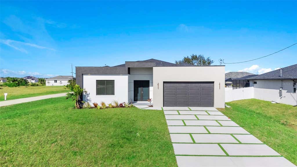 Photo of 2725 Embers Parkway W, Cape Coral, FL 33993 (MLS # O6423151)