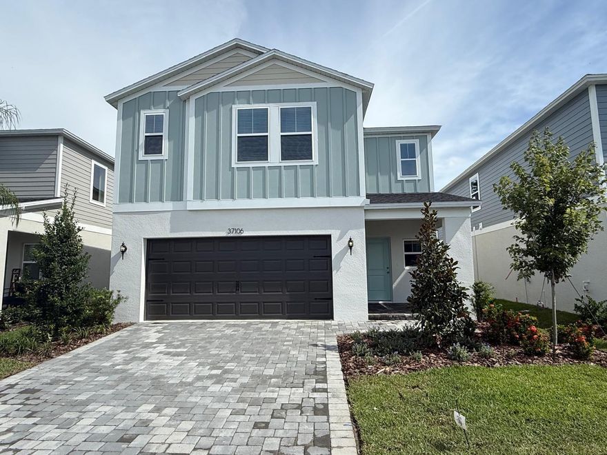 ***Add-ons - Elegant Lighting Fixtures and Fans throughout, Water Softener and Fence install underway and should be in place by end of Nov***
Brand new Modern 5-Bedroom Home in the Desirable Two Rivers Community Discover this spacious 2470 sq ft, 5-bedroom, 3-bath home, perfectly situated in the sought-after Two Rivers community with gorgeous pond views on a oversized lot. Located just off SR 56 and Morris Bridge Road, this residence offers unparalleled convenience near top-rated schools, shopping, dining, and entertainment options. Interior Highlights: Open-concept main living area flooded with natural light and featuring sleek luxury vinyl plank flooring. Gourmet kitchen equipped with quartz countertops, new stainless steel appliances, and ample cabinet spaceideal for both cooking and entertaining. Private bedroom and full bath off the foyer, providing a quiet retreat for guests or family members. Upstairs owner's suite offering a spa-like experience with a walk-in shower, double vanity, and walk-in closet. Three additional spacious bedrooms, a second full bathroom, and a conveniently located upstairs laundry room with a new washer and dryer. Modern Amenities: Smart thermostat with voice control for enhanced comfort. Professionally designed landscaping that complements the home's contemporary elevation. Spacious 2-car garage providing ample storage space. Prime Location: Situated just minutes from premier shopping, dining, and entertainment hotspots such as The Shops at Wiregrass and The Grove at Wesley Chapel. Enjoy proximity to the Epperson and Mirada lagoons, offering unique recreational experiences. With easy access to downtown Tampa and Tampa International Airport, this home provides the perfect blend of peaceful living and metropolitan convenience.communities!