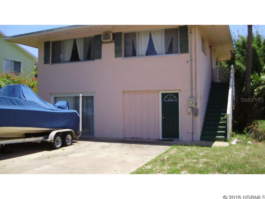 2 BLOCKS TO BEACH FROM THIS 2/2 UPSTAIRS AND 1/1 GROUND LEVEL. CHARMING 2-STORY BEACH PAD WITH HARDWOOD FLOORS, AND LOTS OF WINDOWS UPSTAIRS. DOWNSTAIRS IS OPEN WITH LIVING AREA, BEDROOM, BATH, & WASHER/DRYER. A LITTLE TLC WILL HAVE THIS BEACH HOME SPARKLING!! ;Water: City