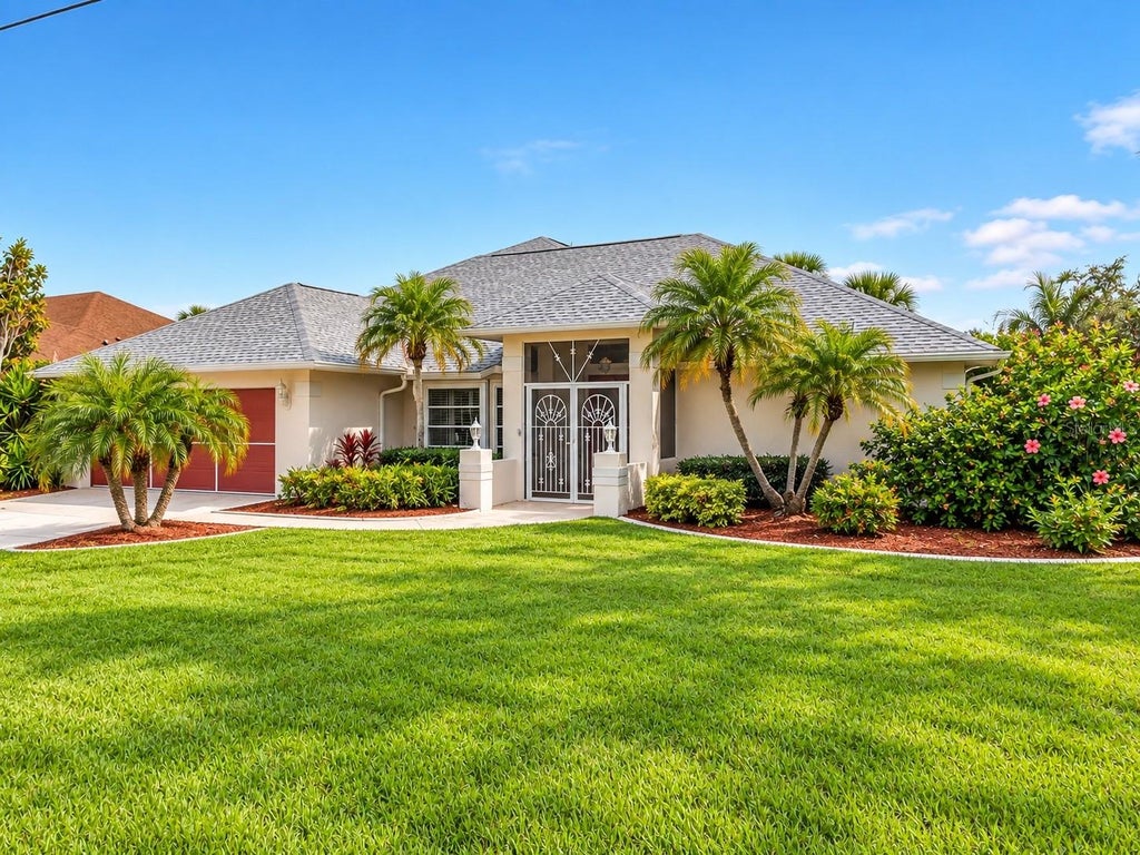 Photo of 63 Clubhouse Road, Rotonda West, FL 33947 (MLS # D6148878)