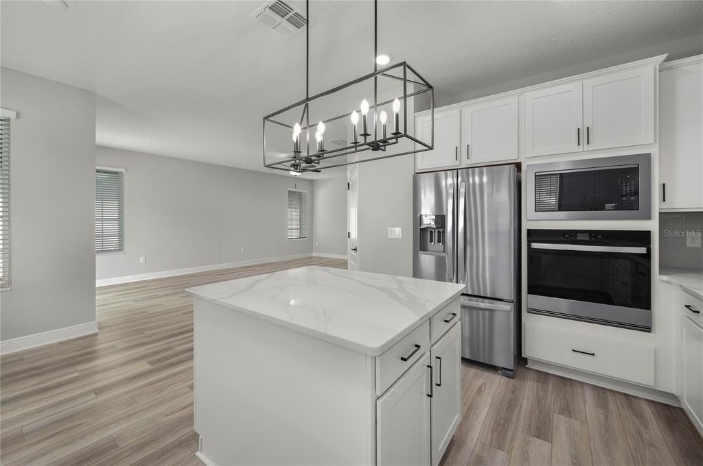 Photo of 1309 Reunion Village Boulevard, Kissimmee, FL 34747 (MLS # TB8438606)