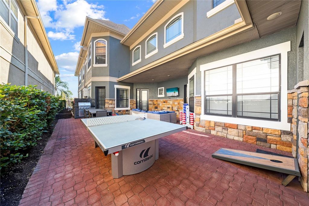 Photo of 785 Golden Bear Drive, Reunion, FL 34747 (MLS # O6383036)