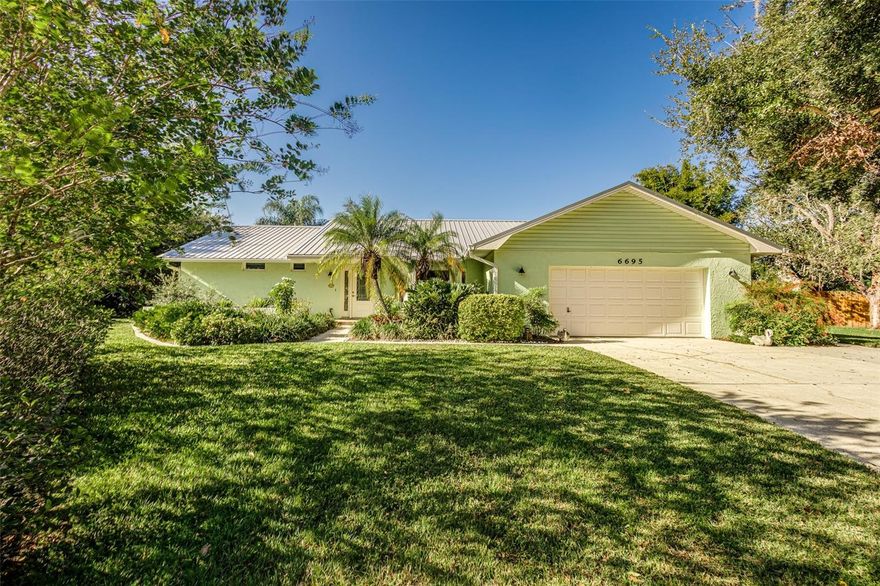 Welcome Home! This Beautifully Remodeled Home is the epitome of elegance and quality. Located in South Lakeland, this 3 bedroom 2 bath pool home in the established Engle Lake neighborhood is a rare find! Shopping, restaurants, and medical facilities are all conveniently located just minutes away. The open floor plan is warm and welcoming. The office/library featuring custom built-ins is the perfect place to work remotely or read a great book. New AC, Daikin Heat Pump, installed March of 2023; the fireplace has an Osburn wood burning insert with sealed chimney flue & fan - Very efficient! Permatile Panel aluminum roof, Soft-Lite Windows, Double-glazed and hung , opening to the inside for easy cleaning. All new kitchen and baths complete with solid natural maple cabinets and Quartz counter tops. Ceramic Tile throughout the home, interior and exterior have been repainted. Blown-insulation R-30 L77 Pro Pink, in the entire attic. New Haywood pool vacuum; Pool cage re-screened. Pavers & bullnose added to the pool deck along with the front walkway and porch. Culligan water system for the entire home and a separate reverse osmosis water purification for the kitchen. A 7 zone irrigation system with new control panel to maintain the garden-like fenced back yard. Outdoor lighting has been added to both the front and back yard. This home is a move in ready Florida dream home!  Call today for your private showing!