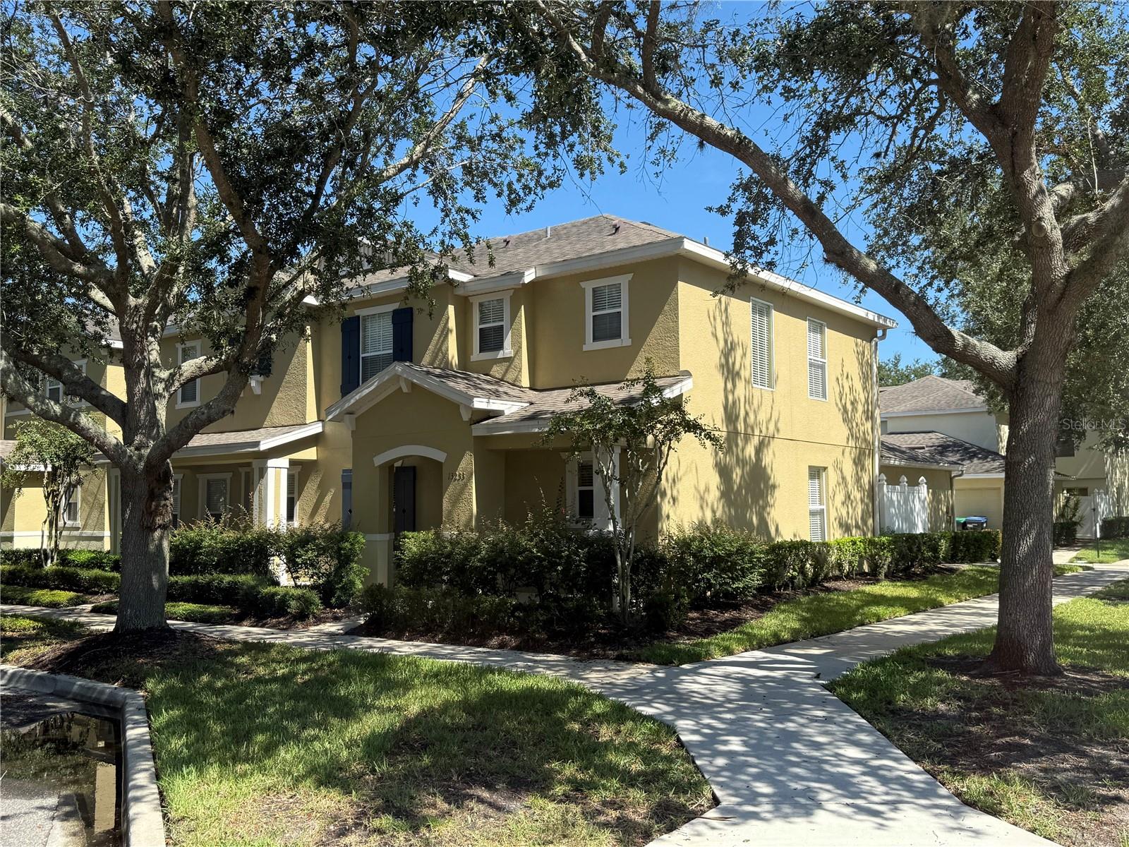Welcome home to your beautiful 3/2.5 with office townhouse in Avalon Park with a $10,000 Buyer credit for a new HVAC or assistance with your closing costs. This well laid out townhouse has almost 1800 square feet of living space, is an end unit townhouse, and across from the Tanja King Memorial Park. As soon as you drive down the tree lined streets with ample parking, you'll love the feel of the neighborhood. As you enter the property, you'll notice the large open floor plan featuring a huge kitchen featuring granite countertops and numerous 42 inch maple cabinets and pantry overlooking the living area. Your bedrooms and laundry room are all on the second floor. Avalon Park is an 1,860-acre neighborhood located in southeast Orange County, close to the natural surroundings of the Econlockhatchee River. Avalon Park has 240 acres of wetlands, 400 acres of upland preserve, 250 acres of man-made lakes, walking/bikingAvalon Park's town-homes provide all the amenities of single-family homes with the additional convenience of no landscaping maintenance. Simply move in and experience the leisurely lifestyle you've looked forward to enjoying. Basic Cable included, Avalon Park Town Center, Community Pool, Fitness, Playground, Clubhouse, Business Center, Tennis Courts, Basketball Courts, Volleyball Courts. Within a few blocks you have Publix, CVS, plenty of restaurants, and so much more.