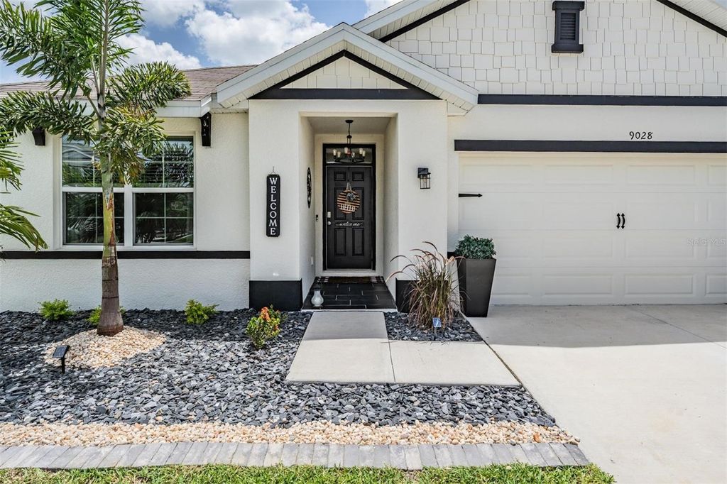 Photo of 9028 Forge Breeze Loop, Wesley Chapel, FL 33545 (MLS # TB8398599)