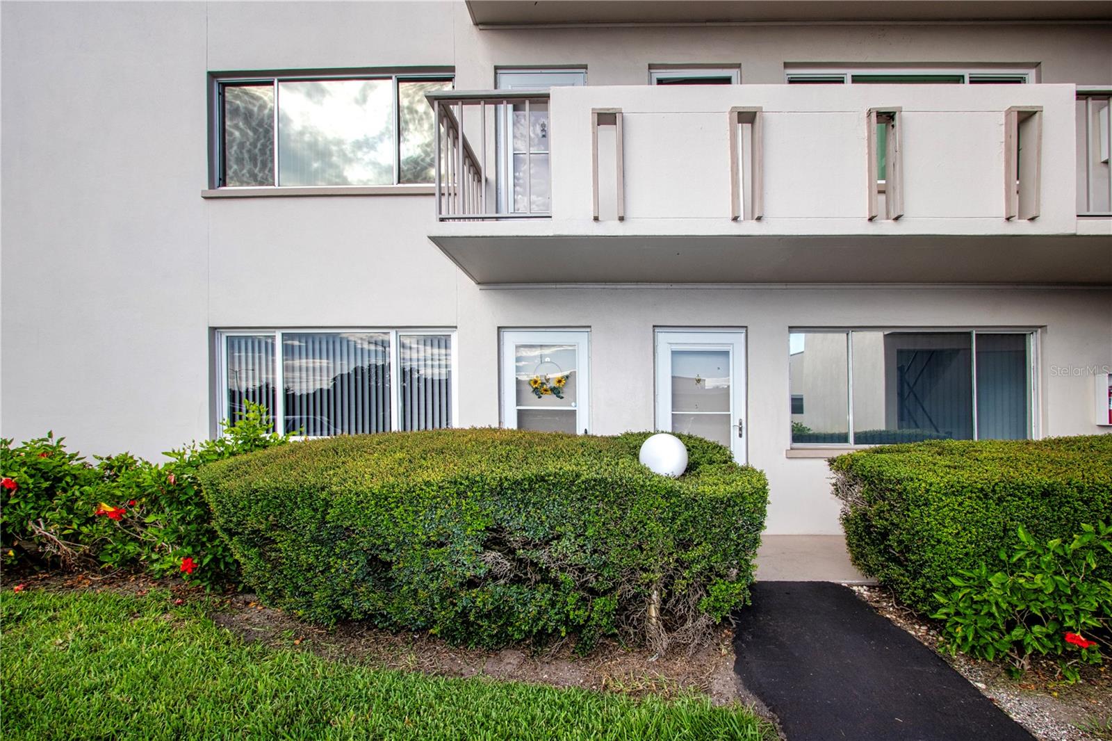 Welcome home! Great opportunity to live in the heart of Bradenton, FL! This charming first-floor end unit offers the perfect blend of comfort and privacy in a beautifully maintained community. Featuring 1 spacious bedroom and 1.5 baths, with gorgeous luxury vinyl plank (LVP) floors throughout this residence. This is ideal for those seeking a tranquil and relaxed lifestyle. Step inside to find a bright, open layout with plenty of natural light and peaceful views. The end-unit location provides an extra sense of privacy, making it a wonderful retreat to call home. The screened lanai is perfect for enjoying your morning coffee or unwinding with a good book in the serene setting. Located in a desirable community, you’ll enjoy access to resort-style amenities and be just minutes from shopping, dining, golf, and the stunning Gulf beaches. Ironwood has clubhouses and pools to serve its many residents, with a beautifully updated building to accommodate your needs just down the block... complete with a heated pool, exercise/weight room, sauna, library, club room, secure lobby, men's & women's locker rooms a and so much more. This unit is complete with a reserved parking space and storage unit. The building has elevator access and recently passed its Milestone Inspection in 2024. Condo fee includes: cable, water, trash, sewer, exterior maintenance, landscaping, amenities and clubhouse(s), reserved parking. This is a MUST see!